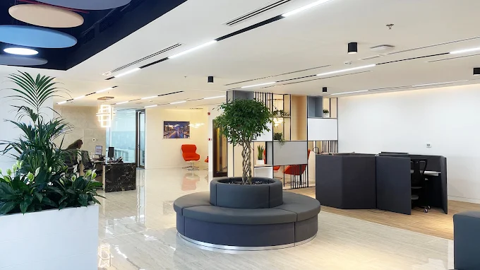 Group of professionals having a meeting inside a managed office, by myOffice