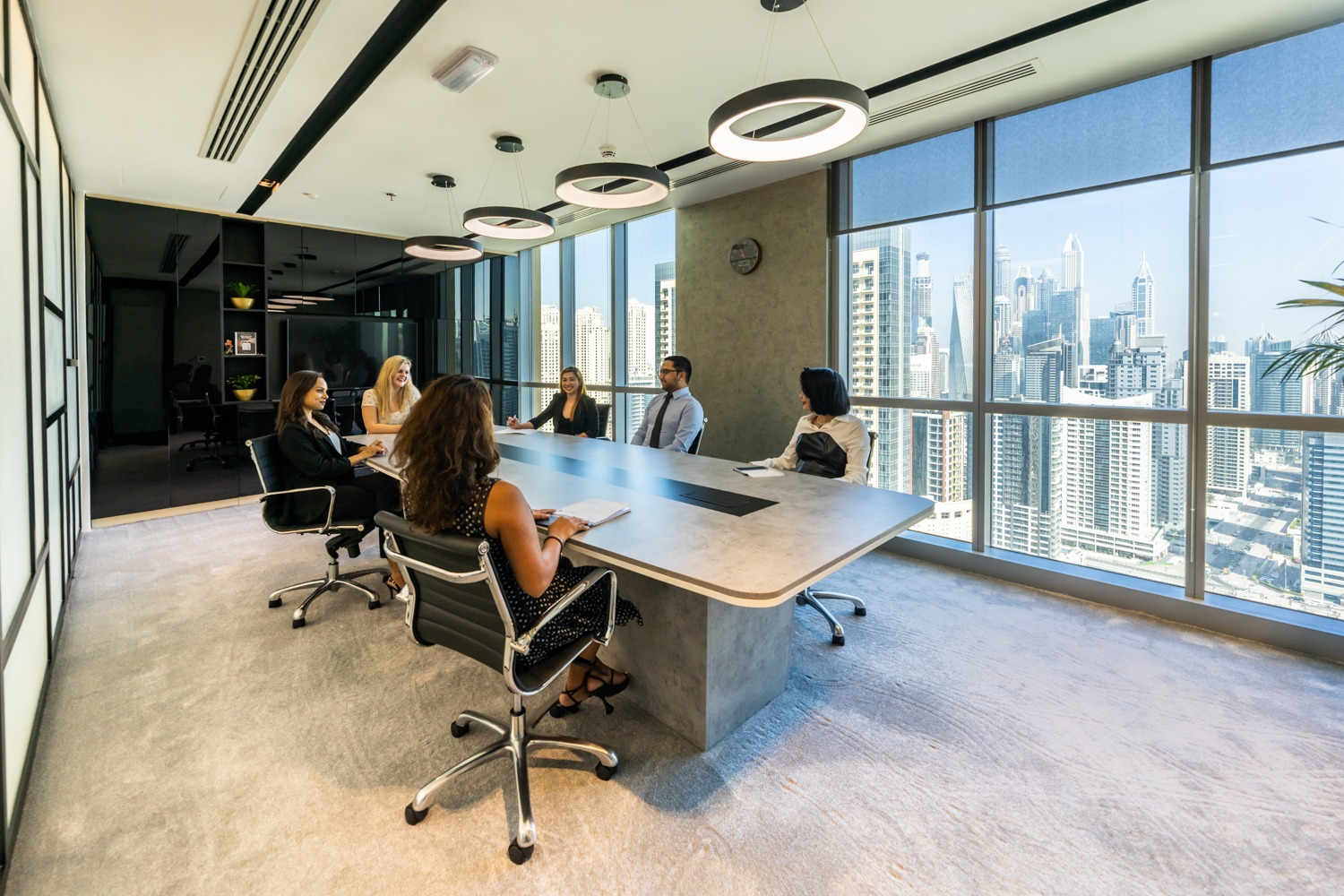 A meeting room in myOffice conducting a professional discussion